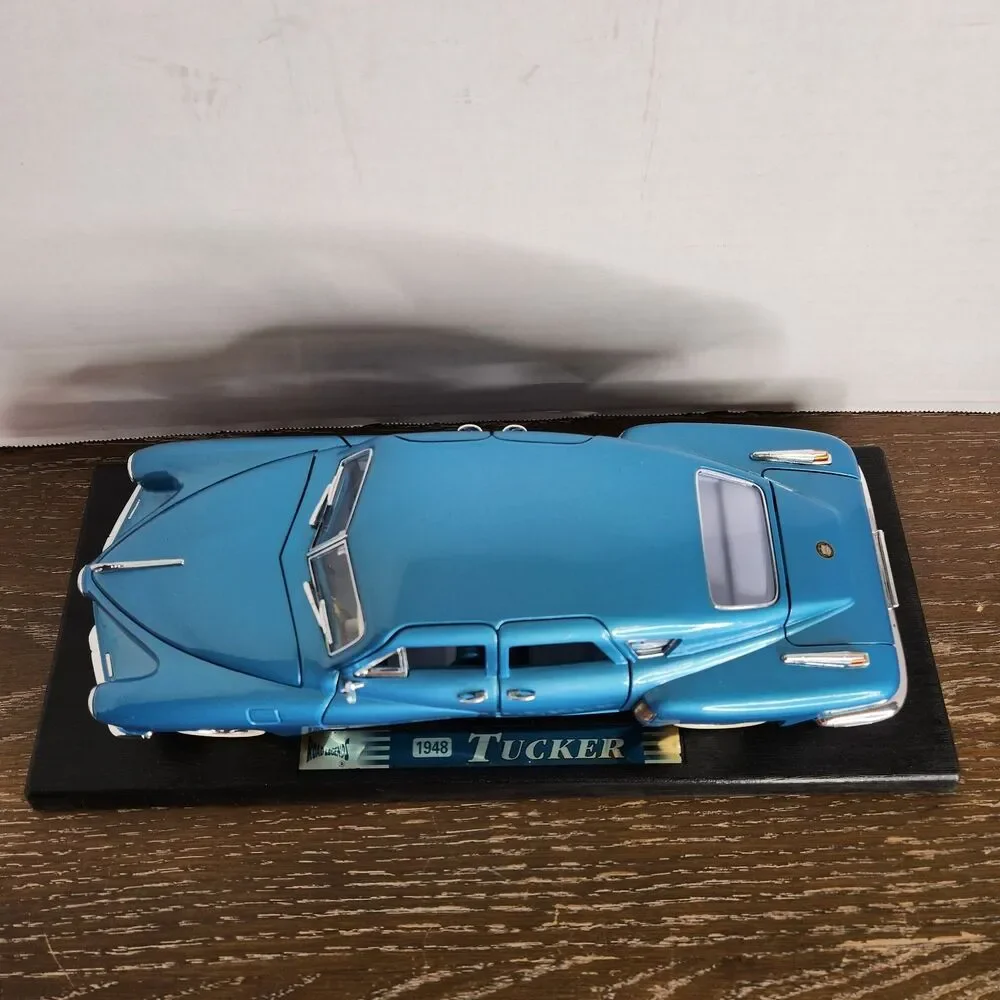 Road Legends 1948 Aqua Blue Tucker 1:18 Diecast Car # 92268 With Box and Stand